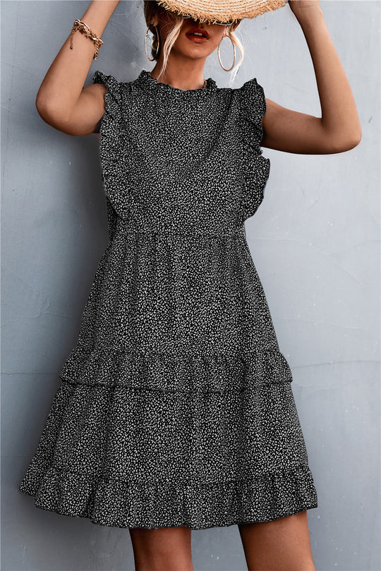 Damen luftiges Sommerkleid mit voluminösen Rüschensäumen und femininer Silhouette EB