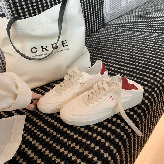 Damen Sportliche Sneaker mit minimalistischer Silhouette und atmungsaktiver Oberflächenstruktur EB