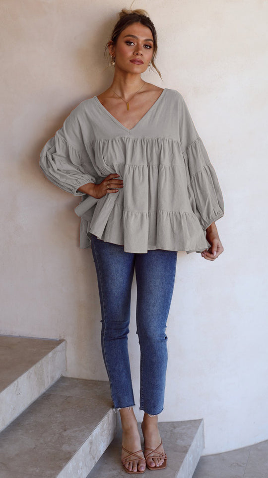 Damen Voluminöses Blusenshirt mit Rüschendetails und V-Ausschnitt EB