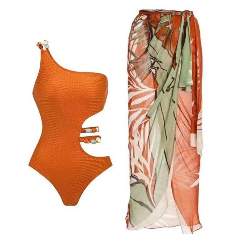 Damen Einteiler Badeanzug mit asymmetrischem Schnitt und floralem Wickelrock EB