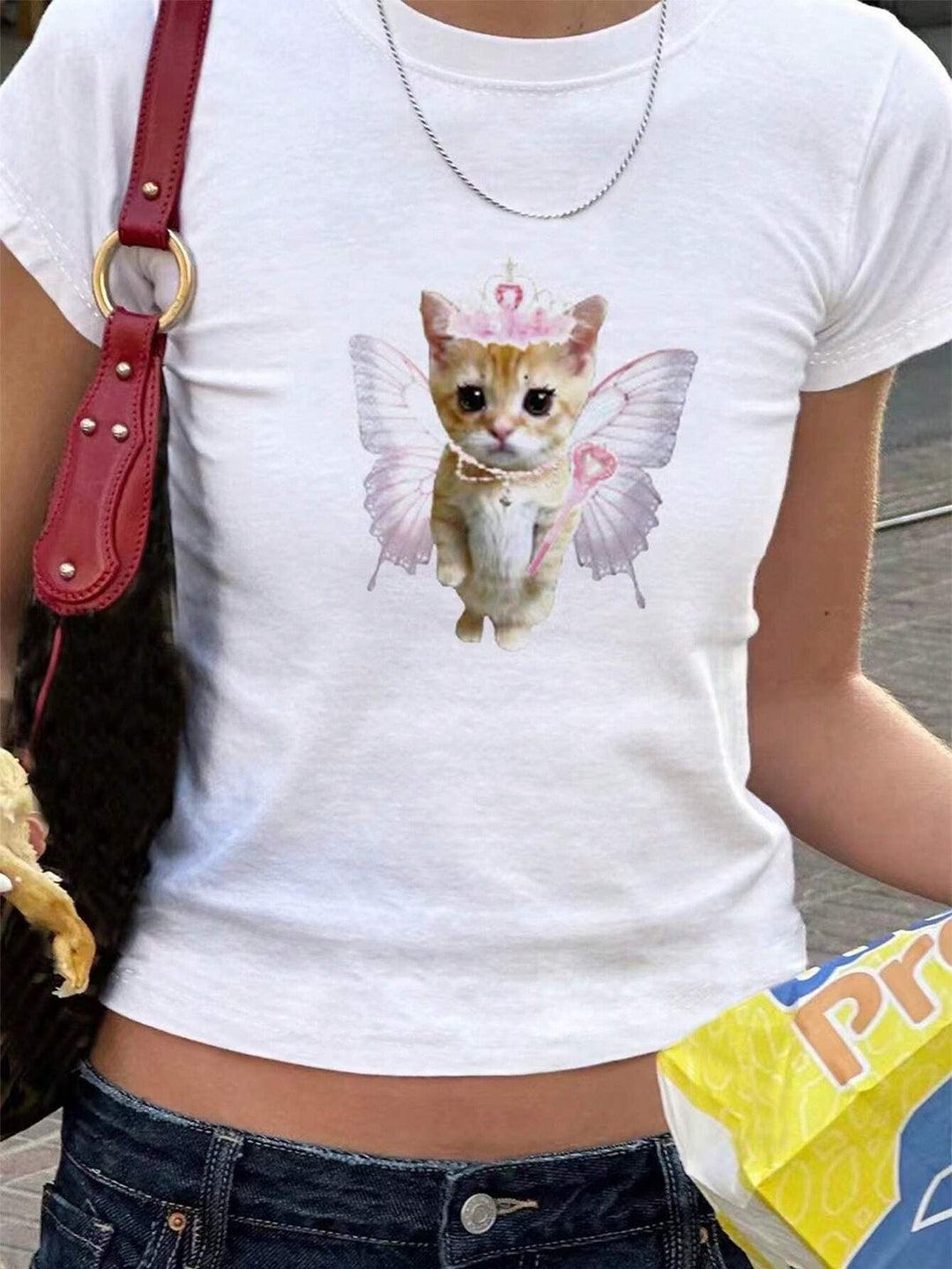 Damen T-Shirt mit verspieltem Katzenmotiv und zarten Flügeln EB