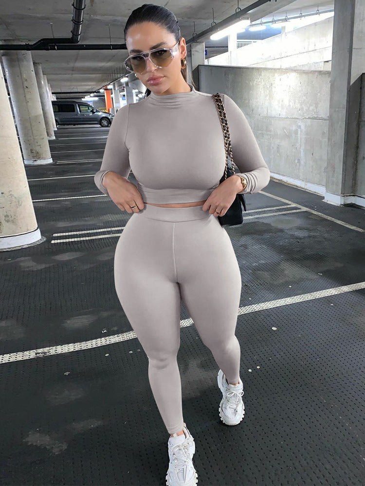 Damen Sportliches Set mit hochgeschlossenem Oberteil und enganliegenden Leggings EB