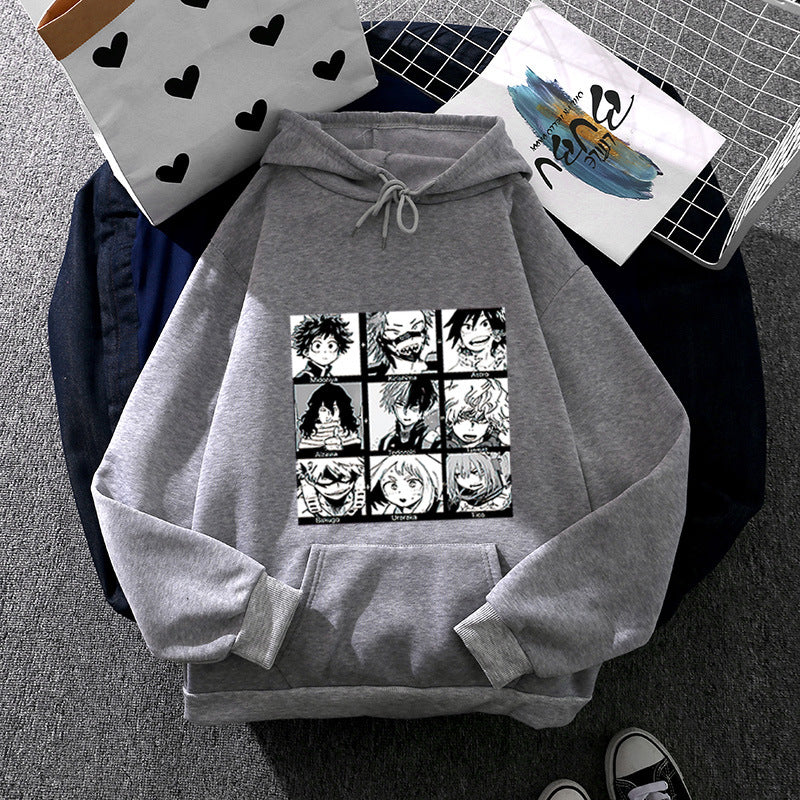 Unisex nan Kapuzenpullover mit quadratischer Manga-Charakter-Collage, leicht oversizeder Schnitt und Kängurutasche EB