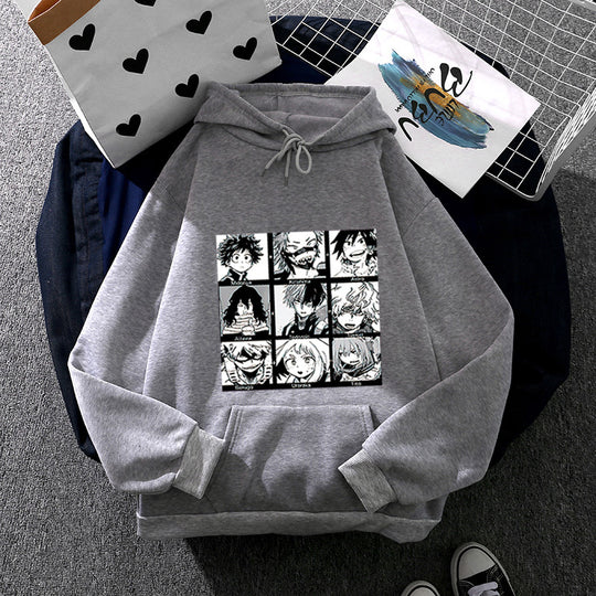 Unisex nan Kapuzenpullover mit quadratischer Manga-Charakter-Collage, leicht oversizeder Schnitt und Kängurutasche EB