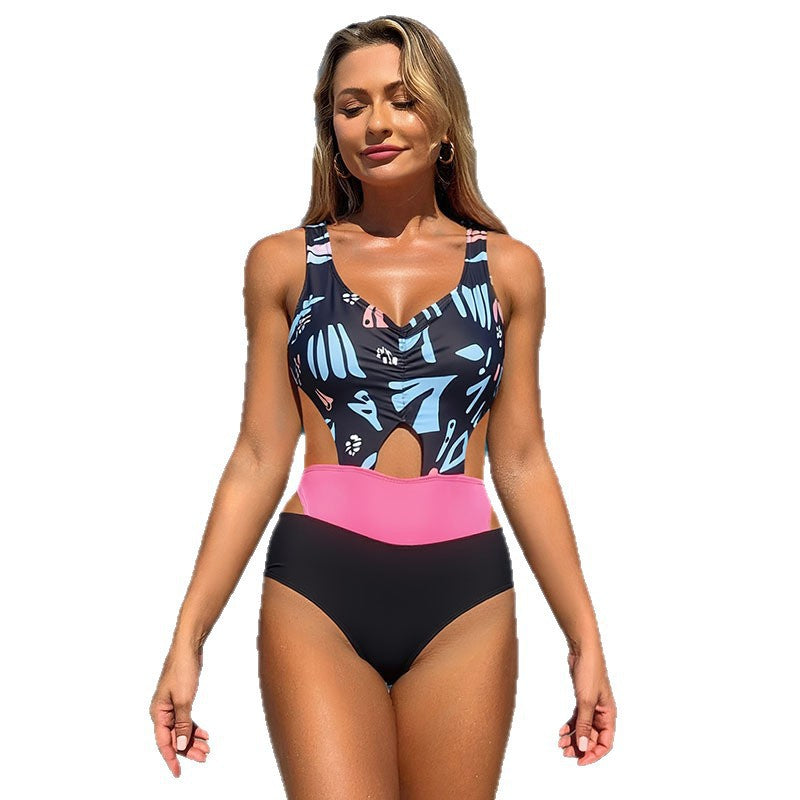 Damen Einteiler Badeanzug mit modernem Cut-Out Design und farbenfrohen Akzenten EB