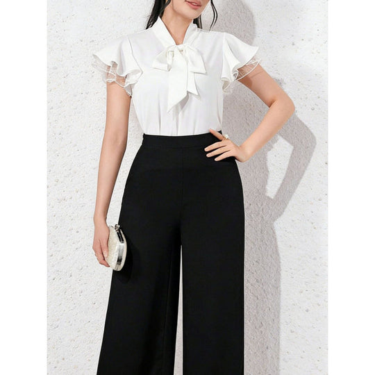 Damen Bluse mit Rüschenärmeln und feminine Schleife EB