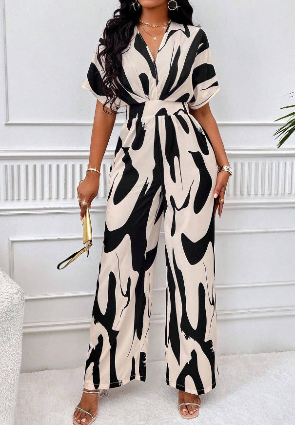 Damen Jumpsuit mit weiten Ärmeln und elegantem Gürtel EB