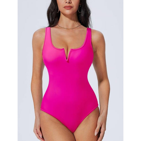 Damen Einteiliger Badeanzug mit tiefem V-Ausschnitt und kontrastierenden Details EB