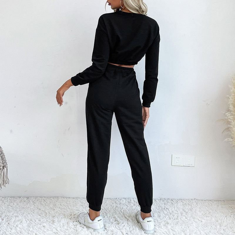 Damen Lässiger zweiteiliger Jogginganzug mit cropped Oberteil und flexibler Taille EB