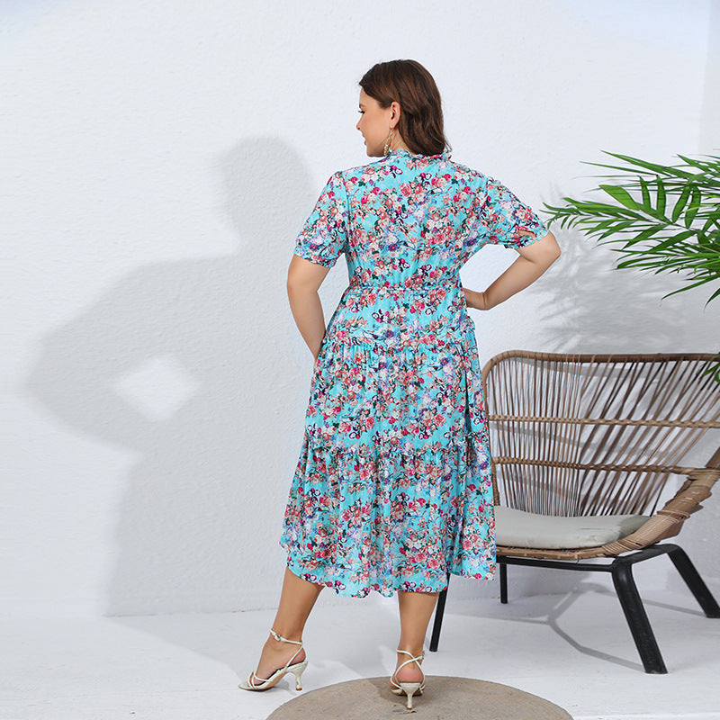Damen Midikleid mit verspieltem Blütenmuster und voluminösem Rock EB
