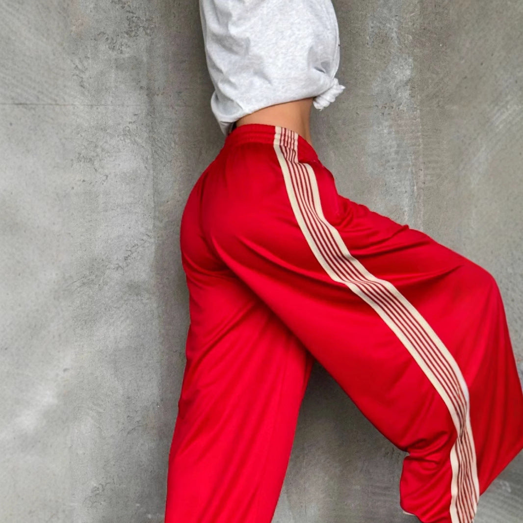 Damen weite Sporthose mit diagonalen Streifen EB