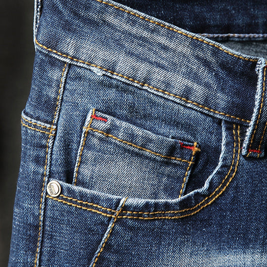 Herren Ripped Jeans im kreativen Farbspray-Design EB