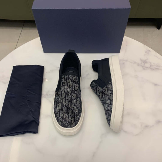 Damen Slip-On Sneakers mit modischem Schlangenleder-Design und praktischem Elastikeinsatz EB