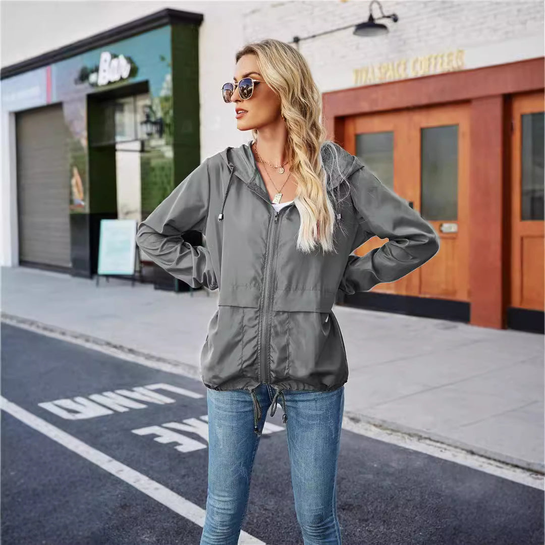 Damen leichte und atmungsaktive Windbreaker-Jacke mit verstellbarem Kapuzenkragen EB