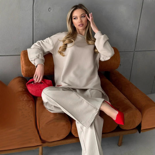 Damen eleganter Lounge-Zweiteiler mit Oversize-Sweatshirt und taillierter Weitbein-Hose Eichborn Berlin