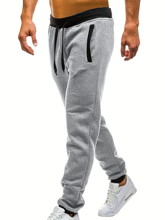 Herren Sportliche Jogginghose mit eingearbeiteten Seitentaschen und verstellbarem Kordelzug EB