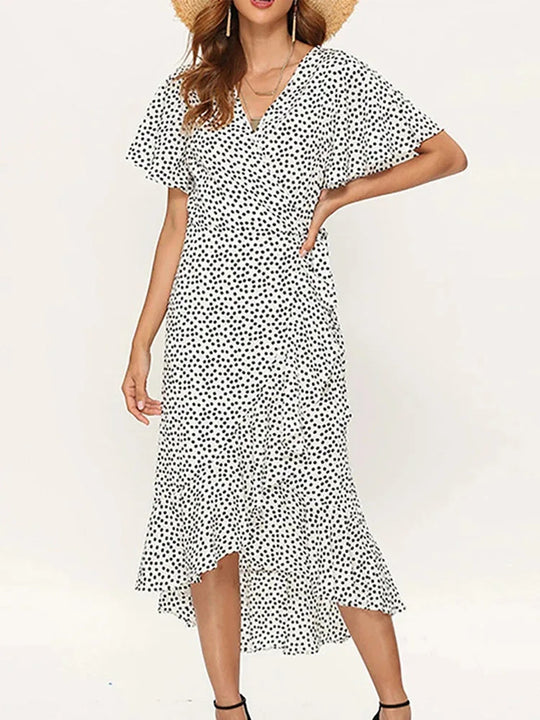 Damen Maxikleid mit floralem Design und schwingendem Saum EB