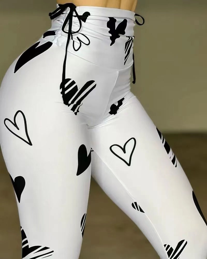 Damen Hochtaillierte Sportleggings mit modernem Herzmuster EB
