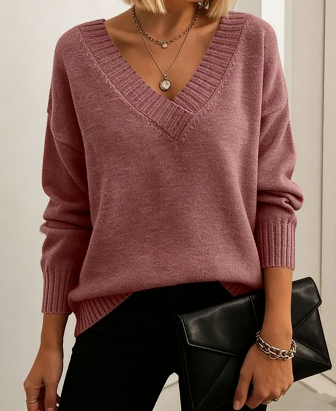 Damen Feinstrickpullover mit tiefem V-Ausschnitt und überschnittener Schulter EB