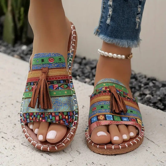Damen Ethno-Slipper-Sandalen mit Quaste und handgenähter Ziernaht EB
