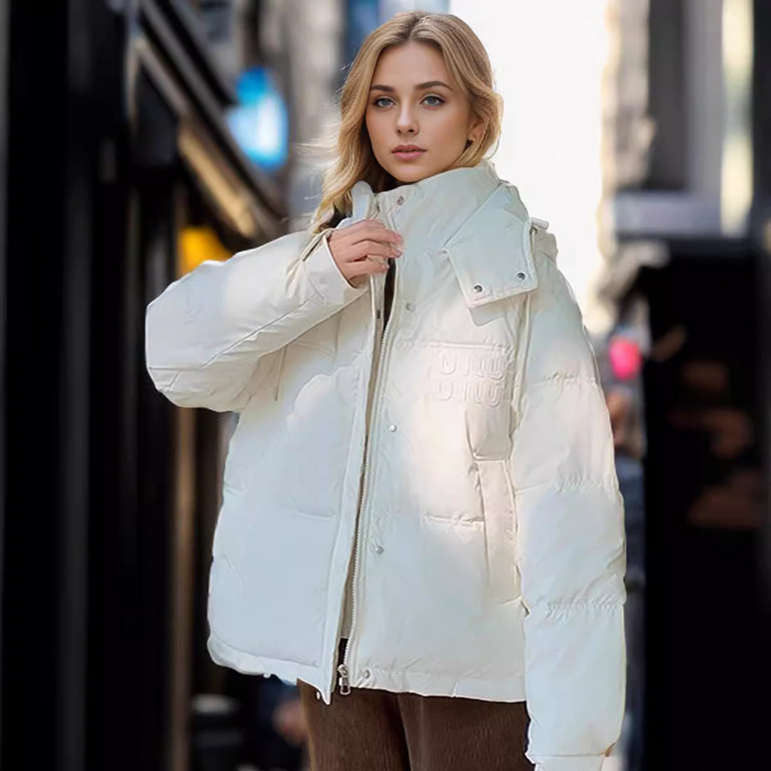Damen gesteppte Winterjacke mit Kapuze und praktischen Taschen EB