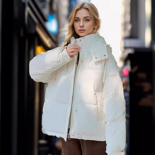 Damen gesteppte Winterjacke mit Kapuze und praktischen Taschen EB