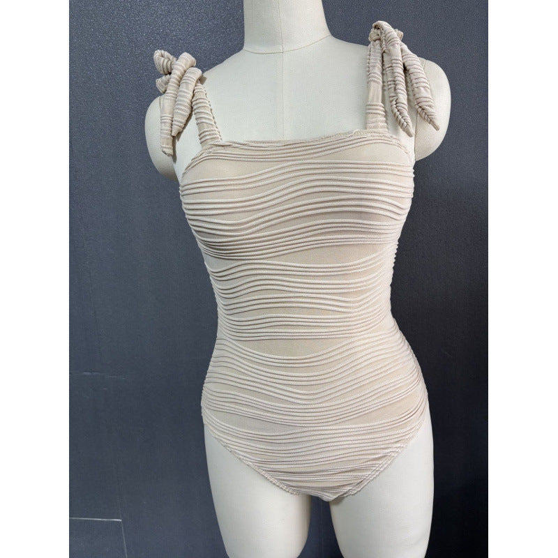 Damen Einteiler Badeanzug mit modischem Wickelrock und eleganten Bindebändern EB