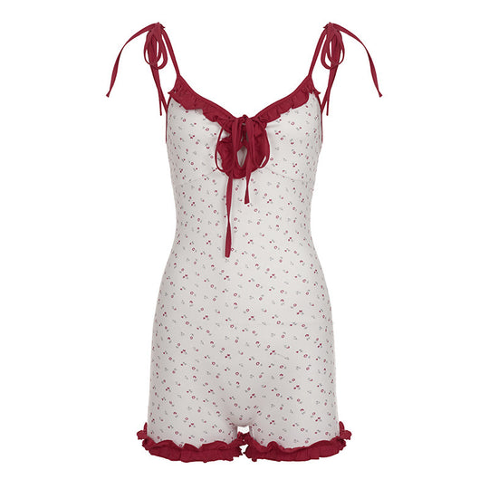 Damen verspielter Jumpsuit mit floralen Akzenten und Rüschendetails EB