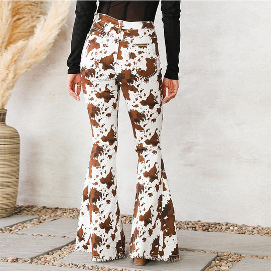 Damen Flared Jeans mit auffälligem Kuhflecken-Muster EB