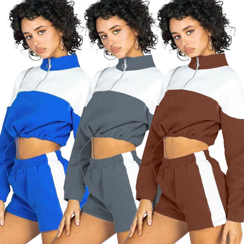Damen modernes Sportoberteil mit kurzem Schnitt und dazu passender Shorts EB