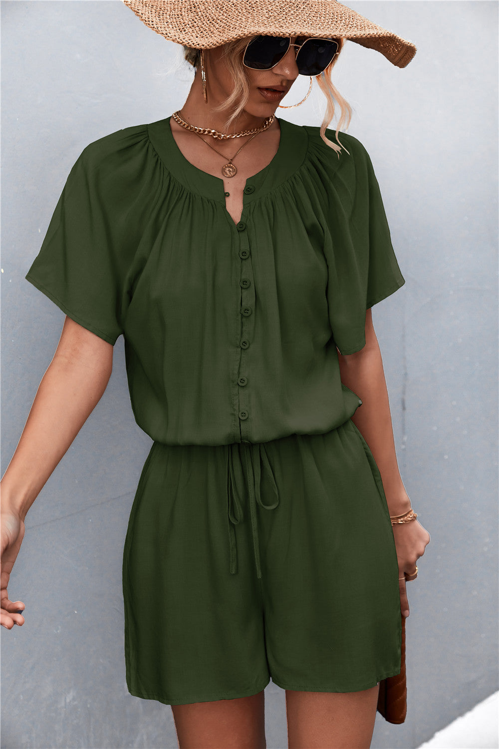 Damen Jumpsuit mit elastischem Bund und knopfverzierter Front EB