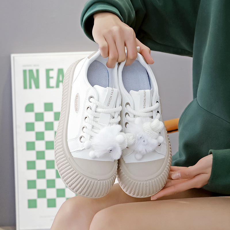 Damen Sneakers mit dekorativen Pompons und rutschfester Laufsohle EB