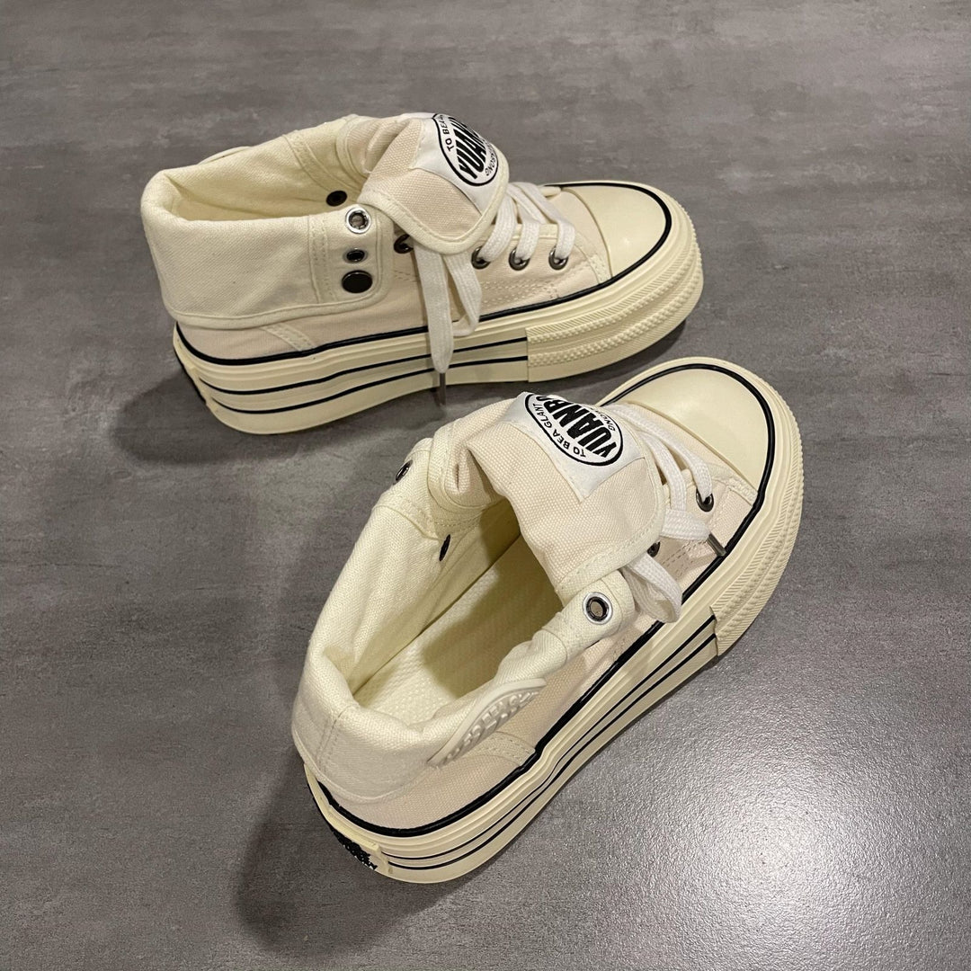 Damen Hochgeschnittene Canvas-Plateausneaker mit markanter Gummiplattform EB