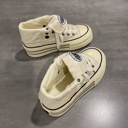 Damen Hochgeschnittene Canvas-Plateausneaker mit markanter Gummiplattform EB