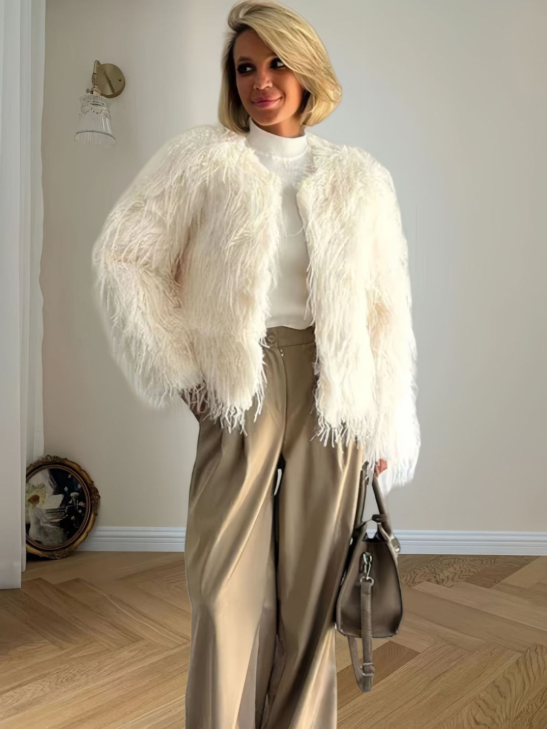 Damen Modische Kunstpelzjacke mit voluminösen Ärmeln EB