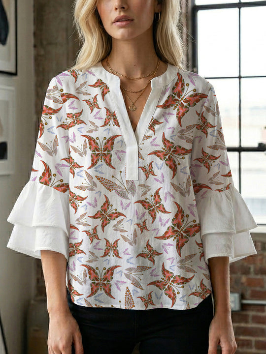 Damen Bluse mit voluminösen Rüschenärmeln und kreativem Floraldesign EB