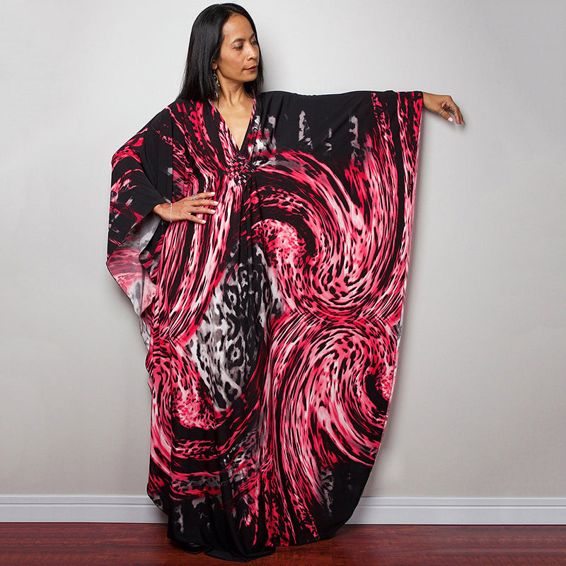 Damen Maxikleid mit kunstvollem Pfauenmuster und seitlichen Schlitzen Heidi Mode