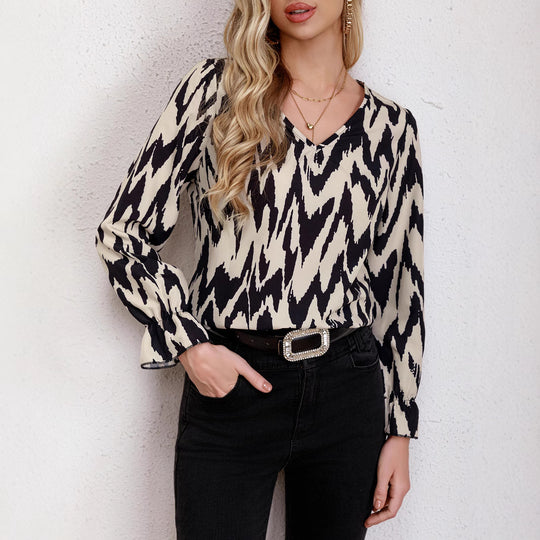 Damen Bluse mit modernem Zickzackmuster und eleganten Ballonärmeln EB