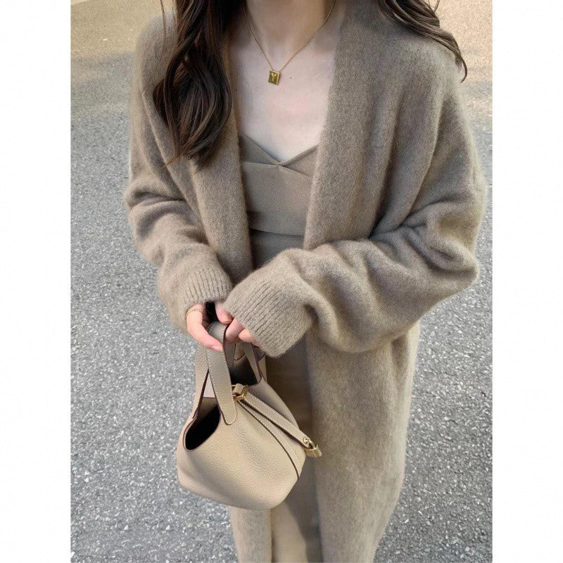 Damen Gemütliche Strickjacke mit oversized Schnitt und sanften Puffärmeln EB