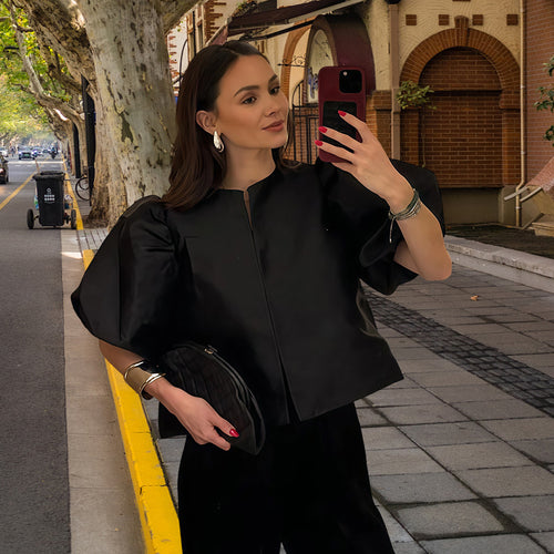 Damen Elegantes Midikleid mit strukturiertem Oberteil und voluminösen Ärmeln EB