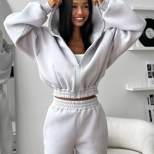 Damen Taillierter Zip-Overall im Loungewear-Stil mit Kapuze, Balloonärmeln und hoher Bundkante EB