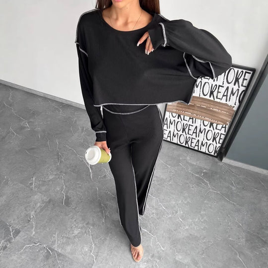 Damen Cropped Oversized-Sweatshirt mit Overlocknähten und High-Waist ausgestellter Hose Set Eichborn Berlin