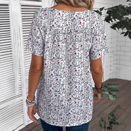 Damen Blusenshirt mit floralem Print und dekorativen Druckdetails Heidi-Mode