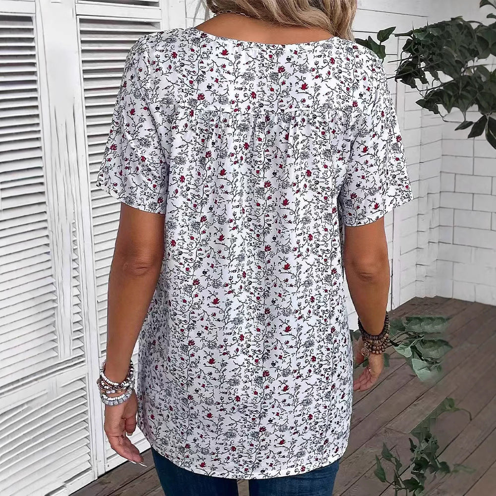 Damen nan lässiges Kurzarm-Tunika-Shirt mit Rundhalsausschnitt, zartem Blumenallover und dekorativen Brustfalten EB