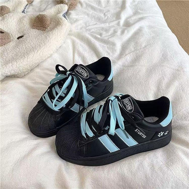 Damen Sneakers im sportlichen Retro-Design mit auffälligen Schnürsenkeln EB