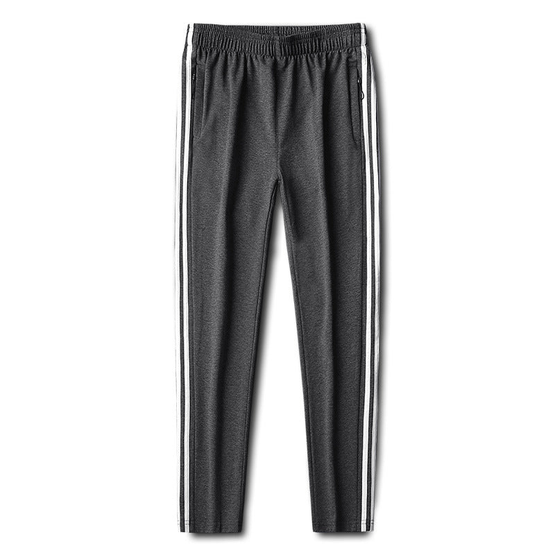 Herren Slim-Fit Trackhose mit seitlichen Kontraststreifen, Reißverschlusstaschen und elastischem Bund EB
