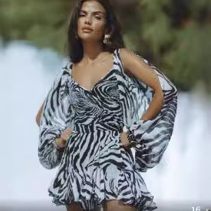 Damen Wickelkleid mit einem eleganten Leopardenmuster und voluminösen Ärmeln EB