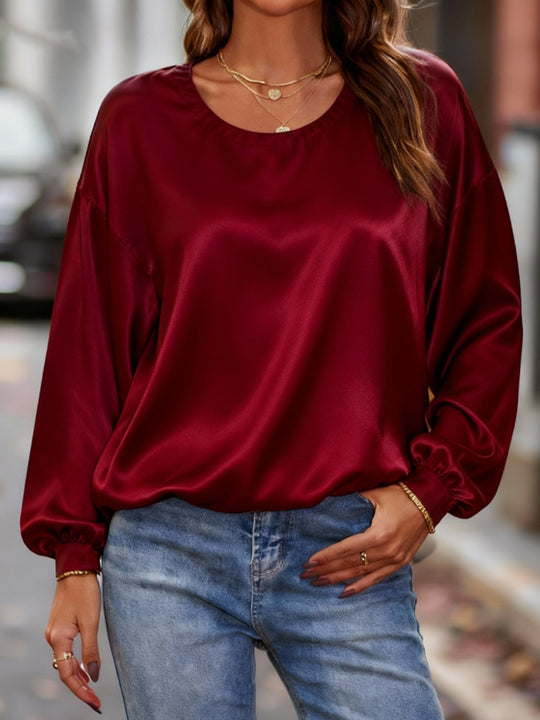 Damen Glänzende Satin-Bluse mit Rundhalsausschnitt und Ballonärmeln EB