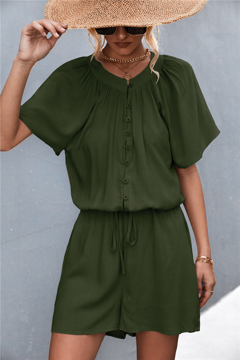 Damen Jumpsuit mit elastischem Bund und knopfverzierter Front EB