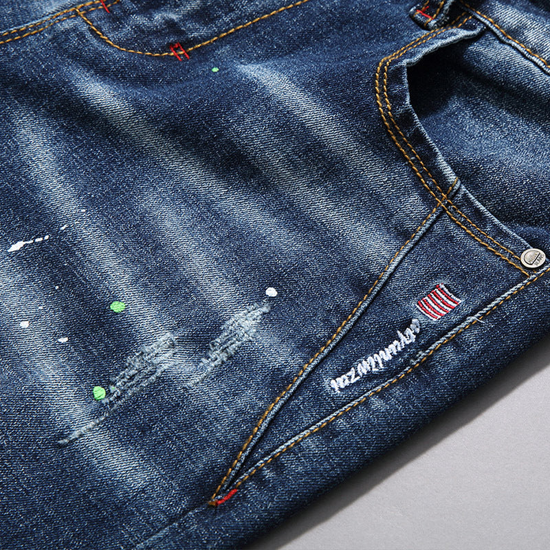Herren modische Jeans mit kreativen Farbklecksen und Rissdesign EB